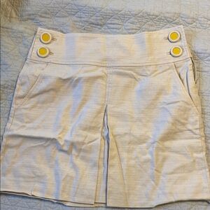 Cream j crew mini skirt with yellow buttons